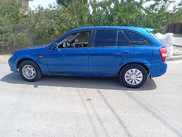чехол на мазду: Mazda 323: 2001 г., 1.6 л, Механика, Бензин, Хэтчбэк — 3