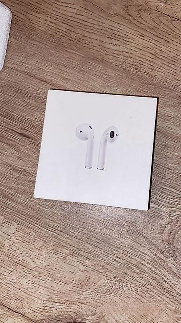 marshall qulaqliq: Apple AirPods with Charging Case (Model: MV7N2ZM/A) - Qablaşdırma — 1