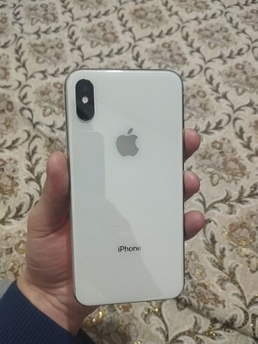 Apple iPhone: IPhone X, Б/у, 64 ГБ, Белый, Защитное стекло, Чехол, 62 %