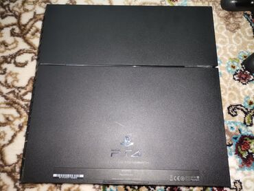 PS4 (Sony Playstation 4): İdeal veziyetde ps4 fat 1tb 14 oyun satılır ev ps olub 2 ilin ps di