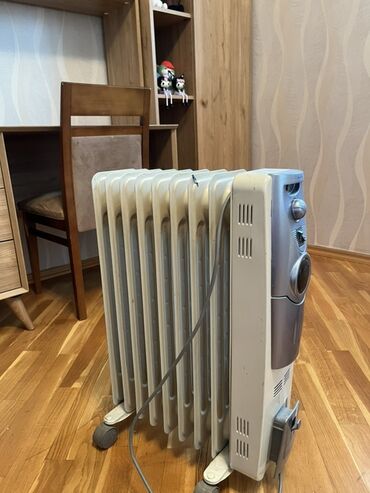 yag qizdirici: Portativ yağlı radiator qızdırıcı, otaqları effektiv şəkildə qızdırmaq