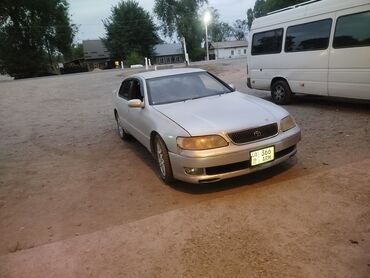 обмен на авто с доплатой: Седан Toyota Aristo серебристого цвета с правым расположением руля