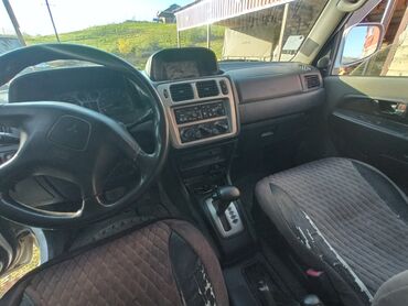 Mitsubishi: Mitsubishi Pajero iO 5 qapı SUV - Kuzov: ağ rəng, 5 qapı, arxa qapıda — 9