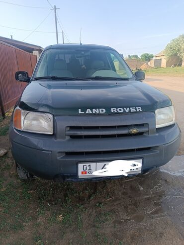 санг енг карандо: Внедорожник Land Rover Freelander темно-зеленого цвета. Этот