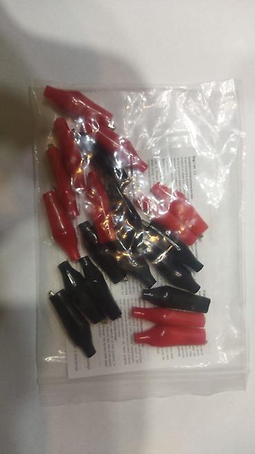 5 dollar şəkli: Krokodil, alliqator. ölçüsü 27mm. 2 cütü 1 azn, 5 cütü 2 azn. Ünvan — 3
