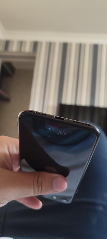 14 iphone ikinci el: 64 GB, Qara, Barmaq izi — 7