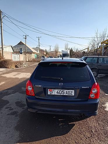 Mazda: Mazda 323: 2002 г., 1.6 л, Механика, Бензин, Хэтчбэк — 8