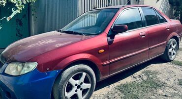 мазда трибуте: Mazda 323 седан, бордовый цвет. Основные характеристики: -Леворульный