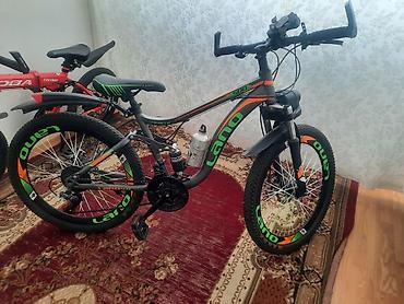 24 velosipedler: LANQ Pioneer dağ velosipedi 24 lük.320 m Almiṣam cox ucuz satiram . - — 5