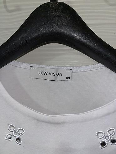 aldo torbice: Bela ženska majica bez rukava brenda LCW Vision, u veličini XS. Model — 3