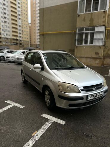 Hyundai: Hyundai Getz, gümüşü rəng Texniki xüsusiyyətlər: - Yanacaq növü — 6