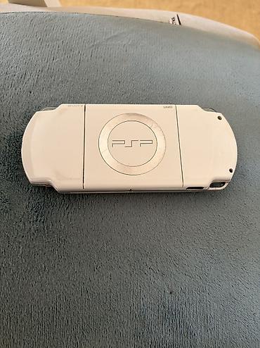 pes 5: Sony PSP-3000, ağ rəng (UMD sürücülü, PSP loqolu arxa qapaq). Portativ — 2