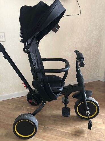Oyuncaqlar: Uşaq üçün 3 təkərli velosiped-araba (trisikl), qara rəng. 150 alınıb