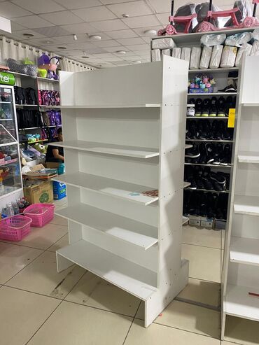 железные стеллажи для магазина: Продаются двухсторонние полки для магазина. Высота 1.8м,ширина 1м