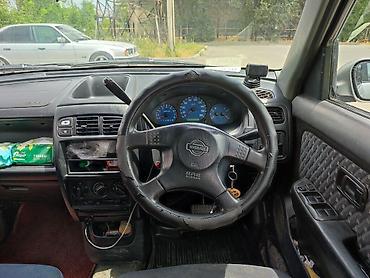 range over: Nissan Cube: 1999 г., 1.3 л, Автомат, Бензин, Минивэн — 8