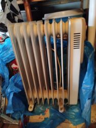 yağ cəkən aparat: Yağ radiatoru(qızdırıcı)