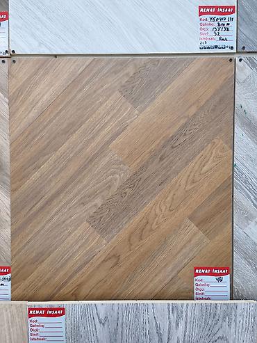 Herringbone naxışlı laminat döşəmə paneli - Taxta teksturalı at lalafo.az Herringbone naxışlı laminat döşəmə paneli - Taxta teksturalı