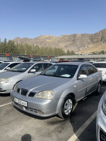 зарядное устройство для автомобилей: Daewoo Lacetti: 2003 г., 1.6 л, Механика, Бензин, Седан