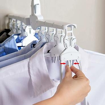 Asılqanlar: Plastik paltar askıları. Kreativ dizaynlı 8 i 1 də. Rahat qatlana — 4