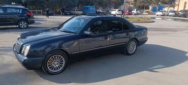 Mercedes-Benz E-Class: 2.8 л | 1998 г. Седан