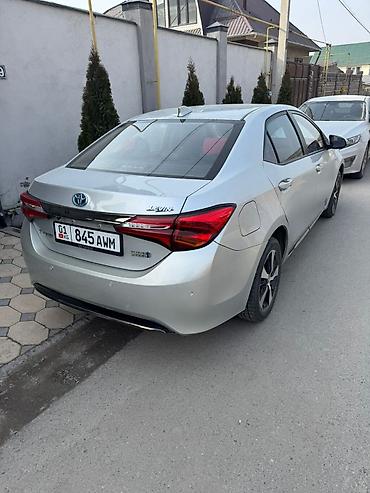 транс: Toyota Corolla: 2020 г., 1.8 л, Вариатор, Гибрид, Седан — 5