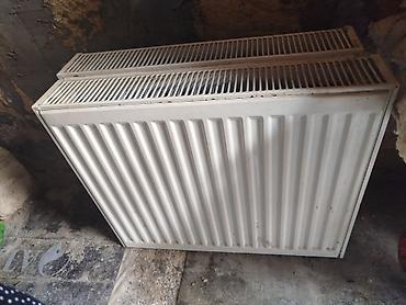 Panel radiator (su ilə işləyən, mərkəzi və ya kombi sistemləri üçün)