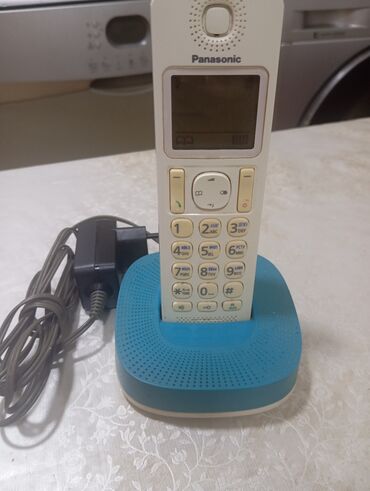 Бытовая химия: Stasionar telefon,Panasonic firması,heç bir deffekti yoxdu,qəşəng