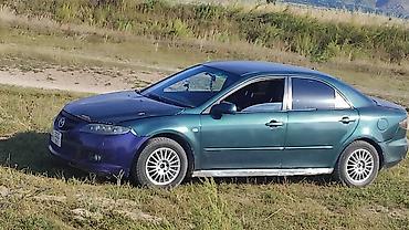 митсубиси спейс стар: Mazda 6: 2002 г., Седан — 1