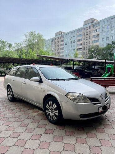 аренда машину: Автомобиль Nissan Primera в кузове универсал серебристого цвета