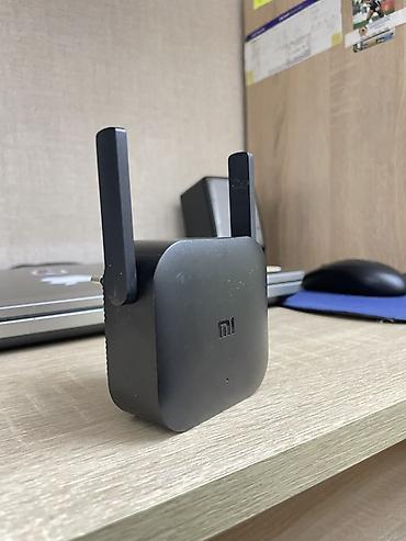 routur: Xiaomi Mi Wi‑Fi Range Extender Pro siqnal gücləndiricisi. İlk öncə — 1
