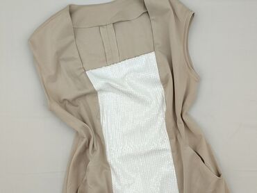 Elegancka sukienka damska w kolorze beżowym, charakteryzująca się
