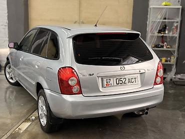 Mazda: Mazda 323: 2003 г., 1.6 л, Механика, Бензин, Универсал — 7
