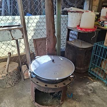 печка котёл: Казан с крышкой на печи под дрова - Казан литой, объём 22 л (отметка — 1