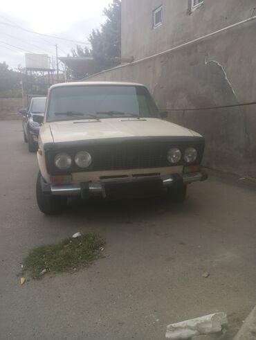 niva qapi uzlukleri: Lada 2106 sedan - Kuzov: bej rəngli, klassik “şeşorka” gövdə, xrom ön