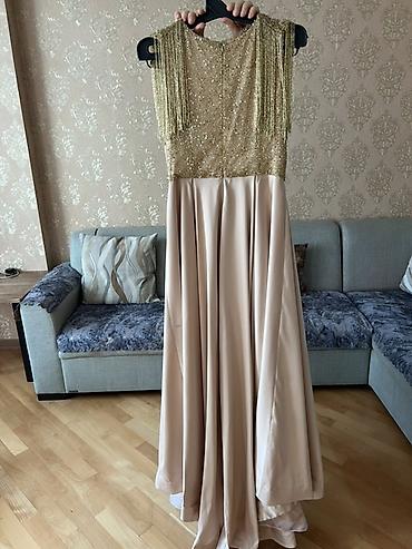 klassik geyim: 850 azna tikdirilib.Nerimanovda moda evinde. 1 defe geynilib. Matirali — 1