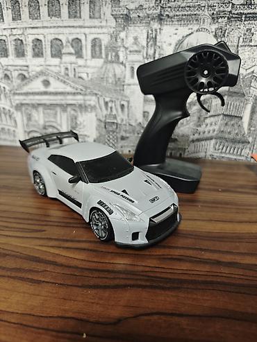 mini disk: Radiouzaqlı idarə olunan mini avtomobil – drift üslubunda sport kupe — 1