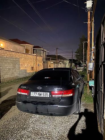 Hyundai: Hyundai Sonata – sedan, qara rəng. Nömrə: 77-NM-935. Texniki və — 1