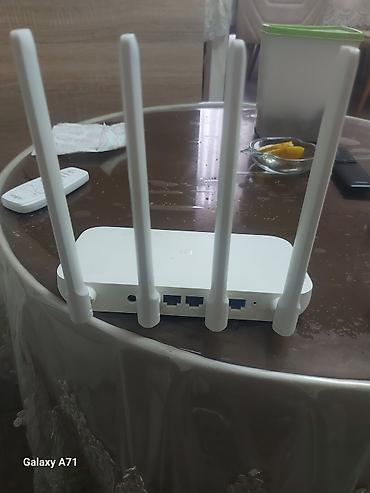 xiaomi modem 4a: Xiaomi Mi Wi‑Fi Router (4 antennali) Xüsusiyyətlər: - 4 ədəd yüksək — 2
