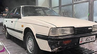 15 disk type 1: Mazda 626: 1985 г., 1.9 л, Механика, Бензин, Фастбек — 7