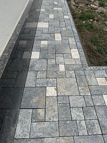 Тротуарная плитка: Тротуарная плитка из камня, выполненная в различных оттенках серого и — 5