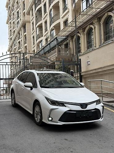 Продажа авто: Toyota Corolla: 2021 г., 1.8 л, Автомат, Гибрид, Седан — 2