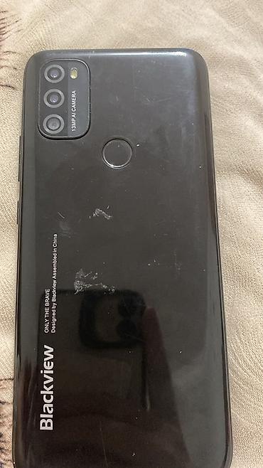 ev telefonlari: Blackview BV (arka qapaqda Blackview loqosu). Android smartfon — 2