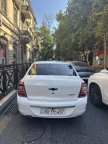 Chevrolet: Chevrolet Cobalt, ağ rəngli, sedan kuzov. Texniki və dizayn — 2