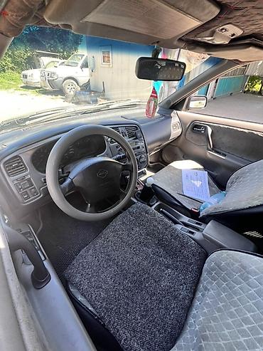 ручной клад: Nissan Primera: 2001 г., 2 л, Механика, Бензин, Универсал — 7