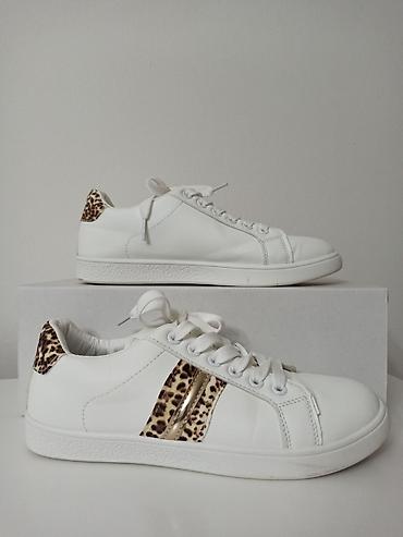 Bele ženske patike sa leopard detaljima - Kao nove (Vel. 38) Prelepe na lalafo.rs Bele ženske patike sa leopard detaljima - Kao nove (Vel. 38) Prelepe