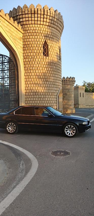 mini cooper 2009: BMW 7 series: 2.8 l | 1997 il Sedan — 5