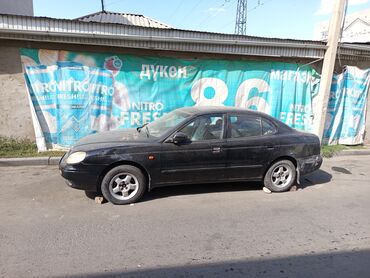 машыны под выкуп: Седан Daewoo Leganza, черный цвет кузова. Ищу хозяина этого машина