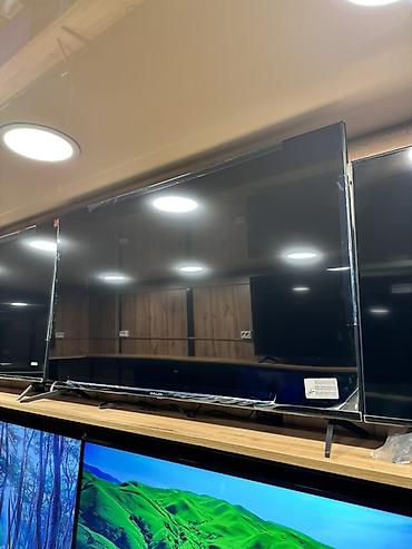 Телевизор AVALON, диагональ около 55–60". Узкие рамки, тонкий корпус
