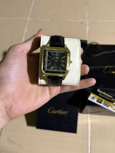 qizil saatlar kisi ucun: Наручные часы, Cartier, цвет - Золотой
