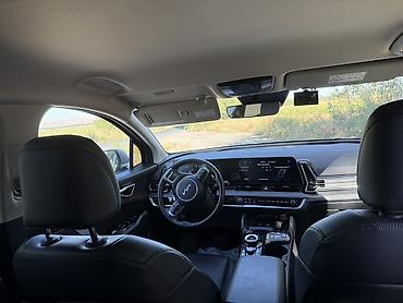 салон машины: Kia Sportage: 2022 г., 1.6 л, Автомат, Гибрид, Кроссовер — 8